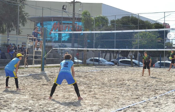 Beach volleyball duo on a sand court