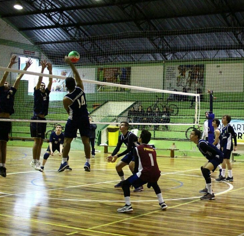 Players in defensive formation on the court